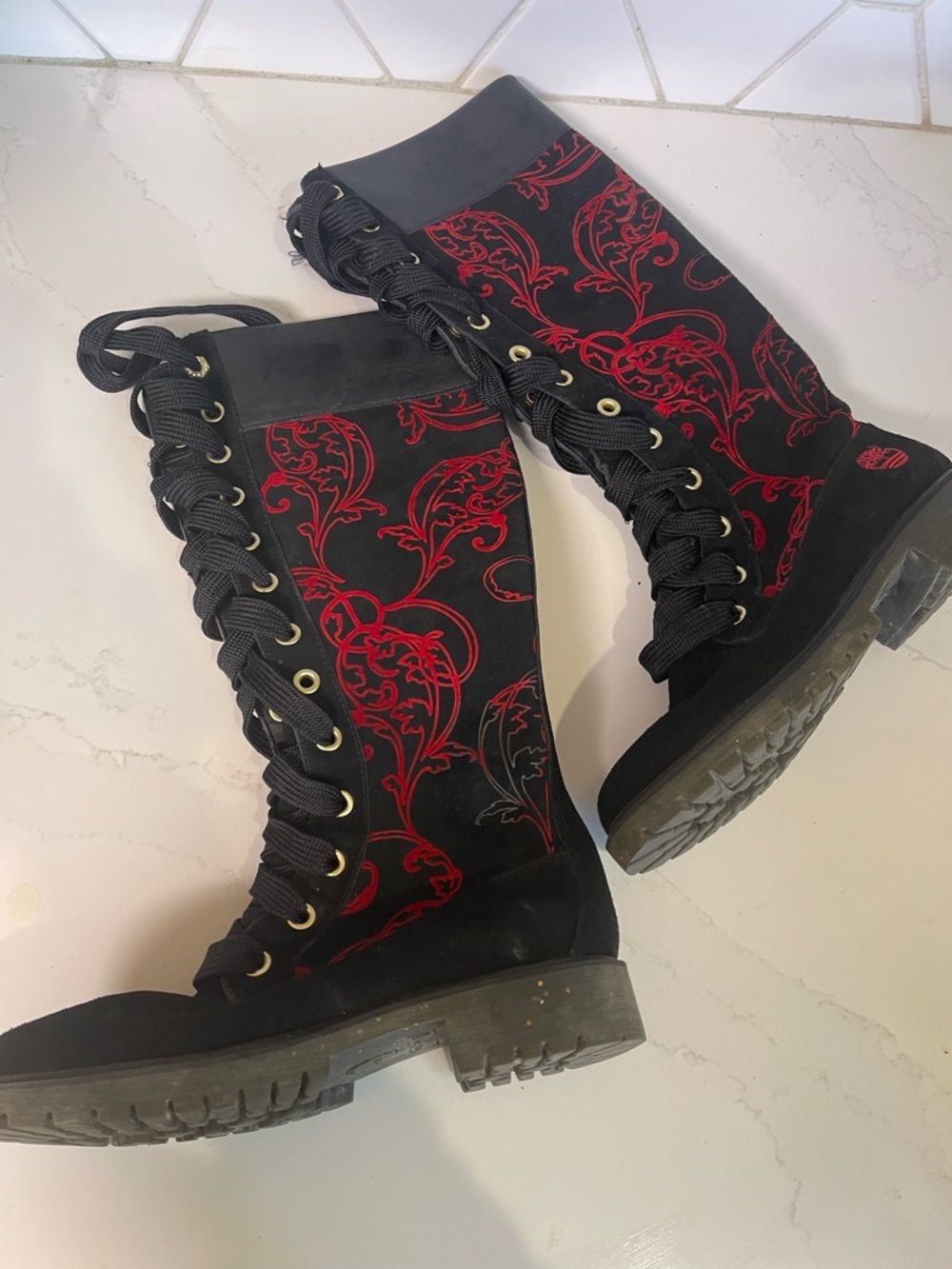Timberland Black Knee-High Lace-Up Boots with Red Embroidered Accent